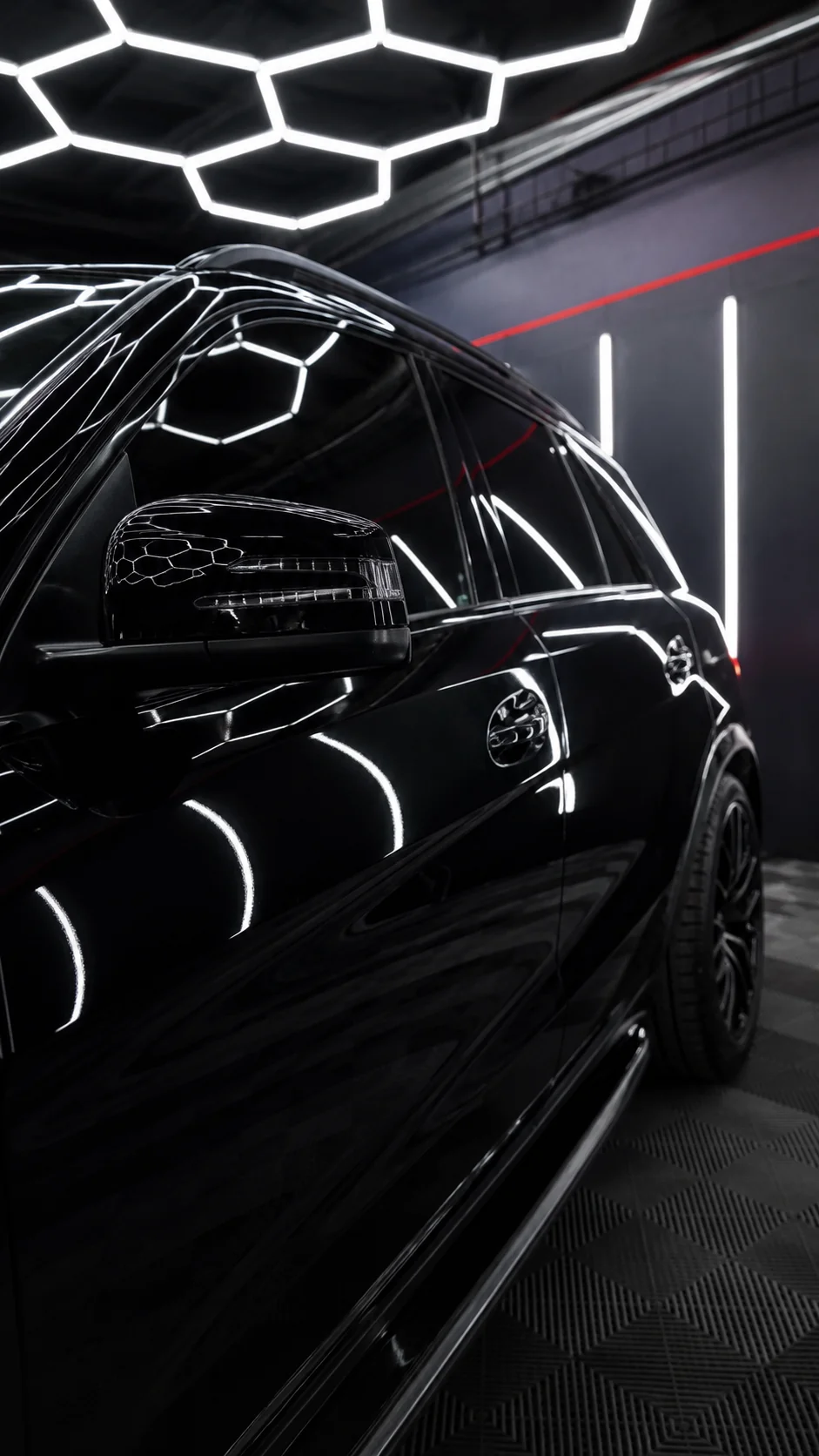 Black luxury SUV in studio — refined automotive finish, South Yorkshire
